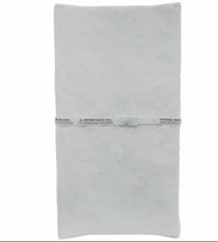 Contoured changing pad cover in white fabric with label strip at bottom