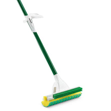 Sponge mop with built-in scrub brush, green handle with white frame and yellow pad.