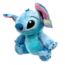 Light blue Stitch plush toy with pink ears and side hang tag