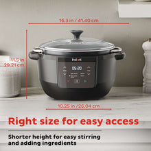 7.5 qt slow cooker with stainless pot, black control panel, and clear glass lid
