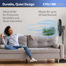 Black oscillating pedestal fan with front metal grille, standing on round base