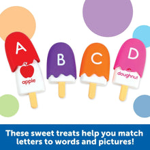 Four alphabet letter pop toys labeled A, B, C, and D with picture word cards