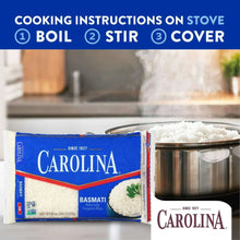 Carolina basmati rice bag beside a pot of white cooked rice