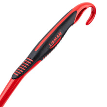 Close-up of red and black scrub brush handle with hanging loop