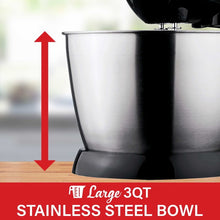 Stainless steel mixing bowl on black stand mixer base, close-up