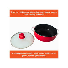 Red ceramic caldero with glass lid, chrome rim, and side handles