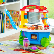 Blue and yellow food cart toy with red roof, wheels, and colorful kitchen accessories