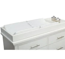 Contoured white changing pad with raised sides and stitched straps on top