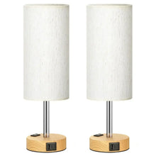 Pair of small table lamps with white fabric shades and wood bases with USB ports