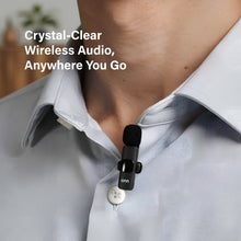 Portable LED video light kit with wireless microphone clipped near shirt collar