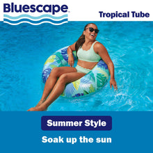 Inflatable swim tube pool float with tropical leaf print, multicolor blue-green