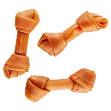 Orange bone-shaped dog chews with twisted rolls