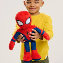 Spider-Man plush stuffed animal held by a child, red mask with web pattern and blue suit