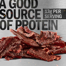 Dark beef jerky strips with text noting 13 grams of protein per serving