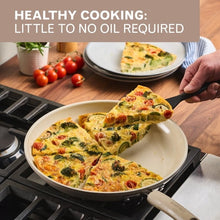Taupe ceramic skillet with two pour spouts and riveted handle