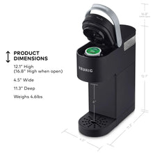 Black Keurig K-Mini single serve coffee maker with pod compartment open