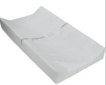 Contoured changing pad, white fabric with stitched edge and slight curve