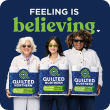 Set of three quilted toilet paper mega rolls packs held by people