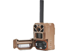 Tan trail camera with extended side battery door and tall antenna
