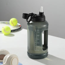 64 oz water bottle with straw, translucent dark body, ounce scale
