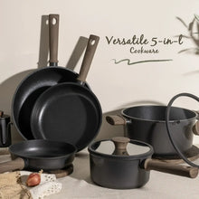 Black nonstick pots and pans set with multiple lids and a matching cookware assortment