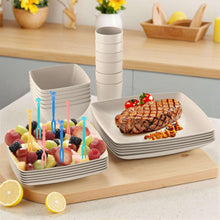 Beige square dinnerware set on tabletop with plates, bowls, and drinking cups