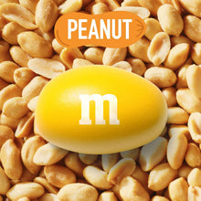 Peanut M&M's milk chocolate candy with yellow shell, close-up view