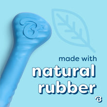 Blue rubber bone chew with embossed paw design, textured natural rubber.