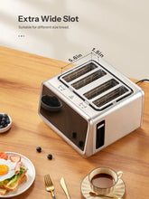 Extra-wide slot toaster showing two long heating chambers on stainless body