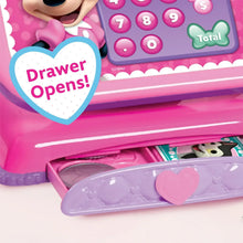 Pink cash register toy with open drawer and heart-shaped panel.