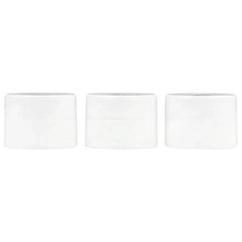 Three white skincare jars for a Vitamin C trial set