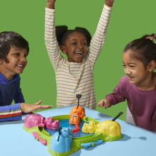 Hungry Hungry Hippos board game with colorful plastic hippos and raised launcher pieces