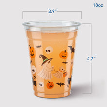 Clear 18-ounce Halloween party cup with orange tint and ghosts, pumpkins, bats and skulls.