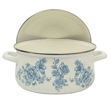 Blue enamel Dutch oven with clear lid and blue floral front