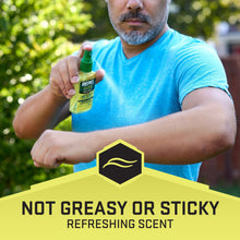 Insect repellent spray bottle held in hand with green sprayer, not greasy or sticky