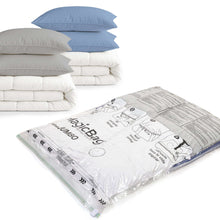 Jumbo vacuum storage bags with fitted seal, stacked with bedding and pillows