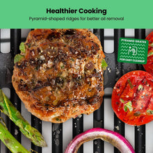 Electric indoor grill cooking a burger on pyramid-shaped ridges