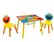 Children’s table and two chairs set with Sesame Street character art on tabletop