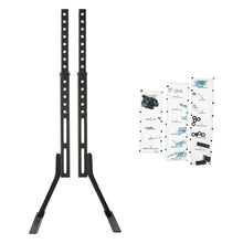 Tabletop TV stand kit with black mounting legs and instruction sheets