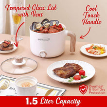 White electric hot pot with tempered glass lid and cool-touch side handle, food inside