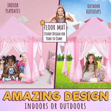 Pink princess castle play tent with sheer curtains and roof; children seated inside for play.