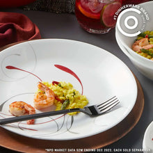 White glass dinner plate with red and gray swirl pattern, shrimp and rice