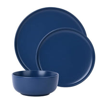 Blue stoneware dinnerware set with large plates and bowl, stacked