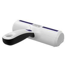 Reusable pet hair lint roller with white body, black strip, and purple drum