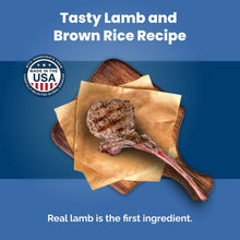 Lamb and brown rice recipe card with lamb pieces and wood board