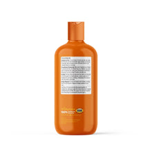Zesty Paws flea and tick shampoo bottle, orange with back label