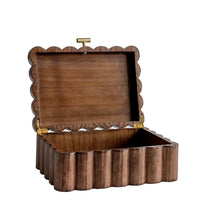 Wooden jewelry box with lid open and scalloped compartments, natural brown finish.