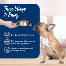 Dog beside 'Three Ways to Enjoy' feeding panel for wet dog food