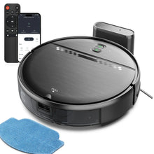 Black robot vacuum with mop cloth and remote control next to it