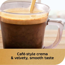 Espresso-style coffee drink in a mug with foam and text 'Café-style crema & velvety'